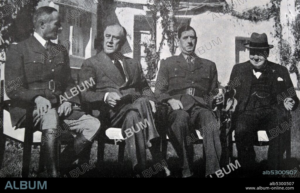 Black and white photograph of World War II (1939-1945); Photograph of four men seated at the Casablanca Conference: French General Henri Giraud (1879-1949), US President Franklin D. Roosevelt (1882-1945), French General Charles de Gaulle (1890-1970) and British Prime Minister Sir Winston Churchill (1874-1965), in January 1943.