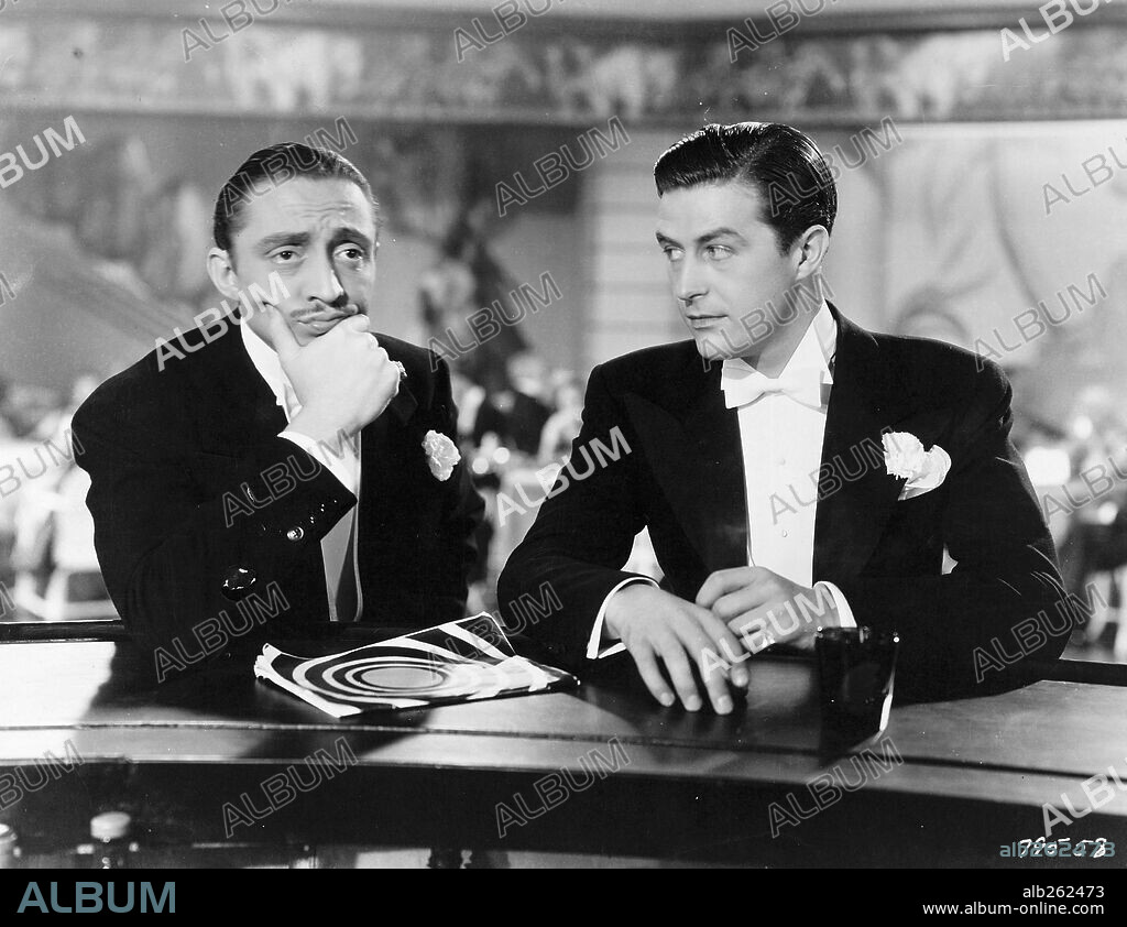 MISCHA AUER and RAY MILLAND in THREE SMART GIRLS, 1936, directed by HENRY KOSTER. Copyright UNIVERSAL PICTURES.
