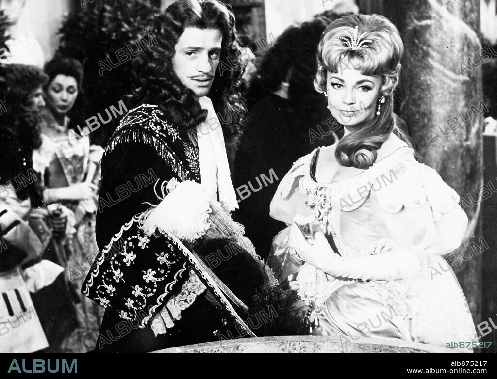 DANY ROBIN and JEAN-PAUL BELMONDO in FAMOUS LOVE AFFAIRS, 1961 (LES AMOURS CELEBRES), directed by MICHEL BOISROND. Copyright GENERALE EUROPEENNE DE FILMS.