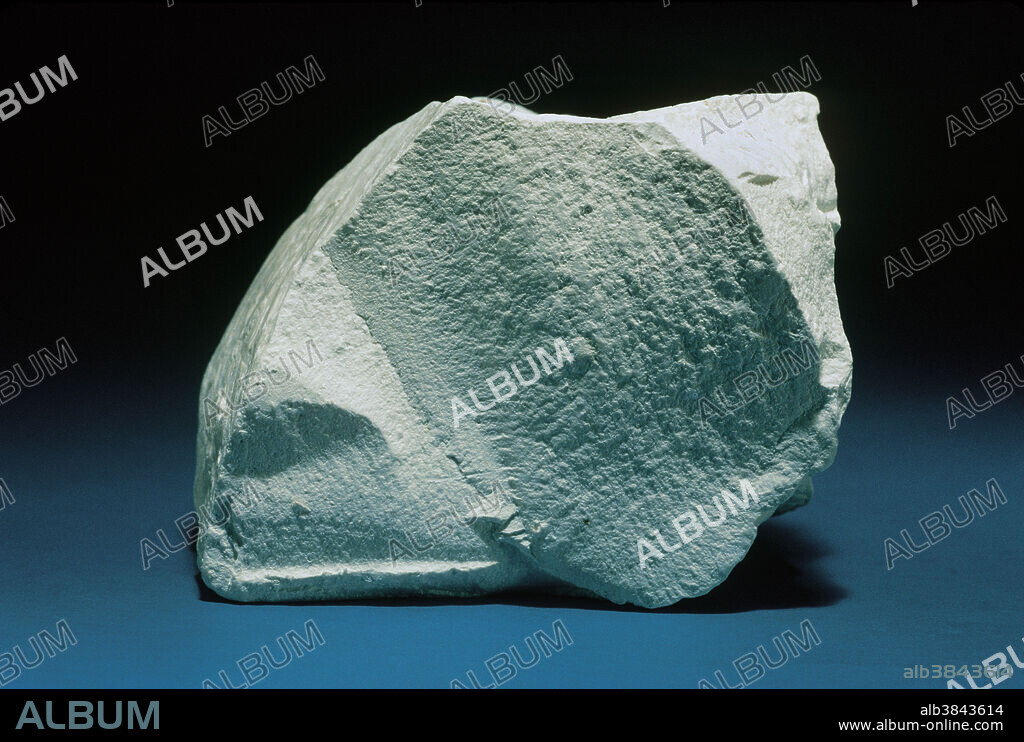 Fracture describes the way a mineral breaks when it does not display cleavage, the tendency to split along specific planes. Fracture is described with terms such as hackly, even, uneven, fibrous, splintery, etc. Even fracture describes a smooth broken surface that is not perfectly flat. Kaolin, a clay mineral that forms dense aggregates of extremely tiny particles, displays this property quite well.