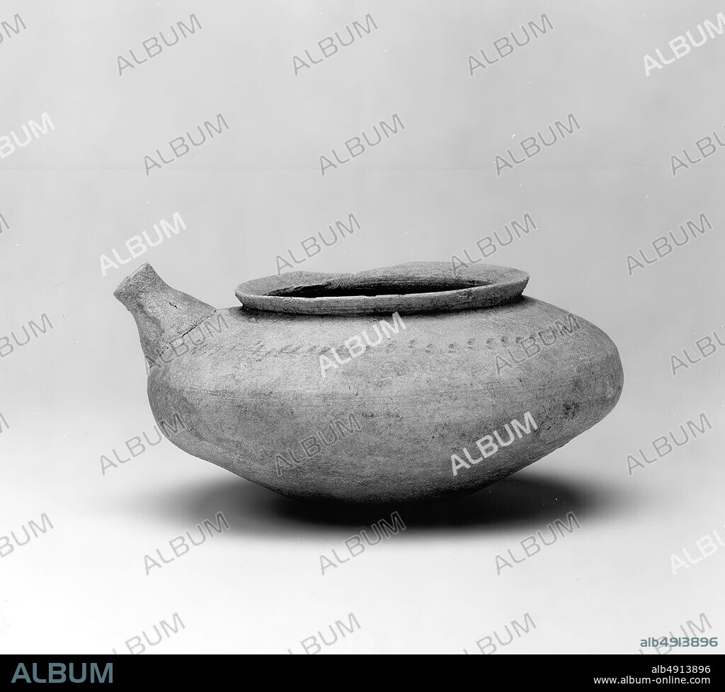Jar with a spout and punctate decoration, Late Uruk, Date ca. 33003100 B.C., Mesopotamia or Syria, Ceramic, 2.76 x 5.24 in. (7.01 x 13.31 cm), Ceramics-Vessels.