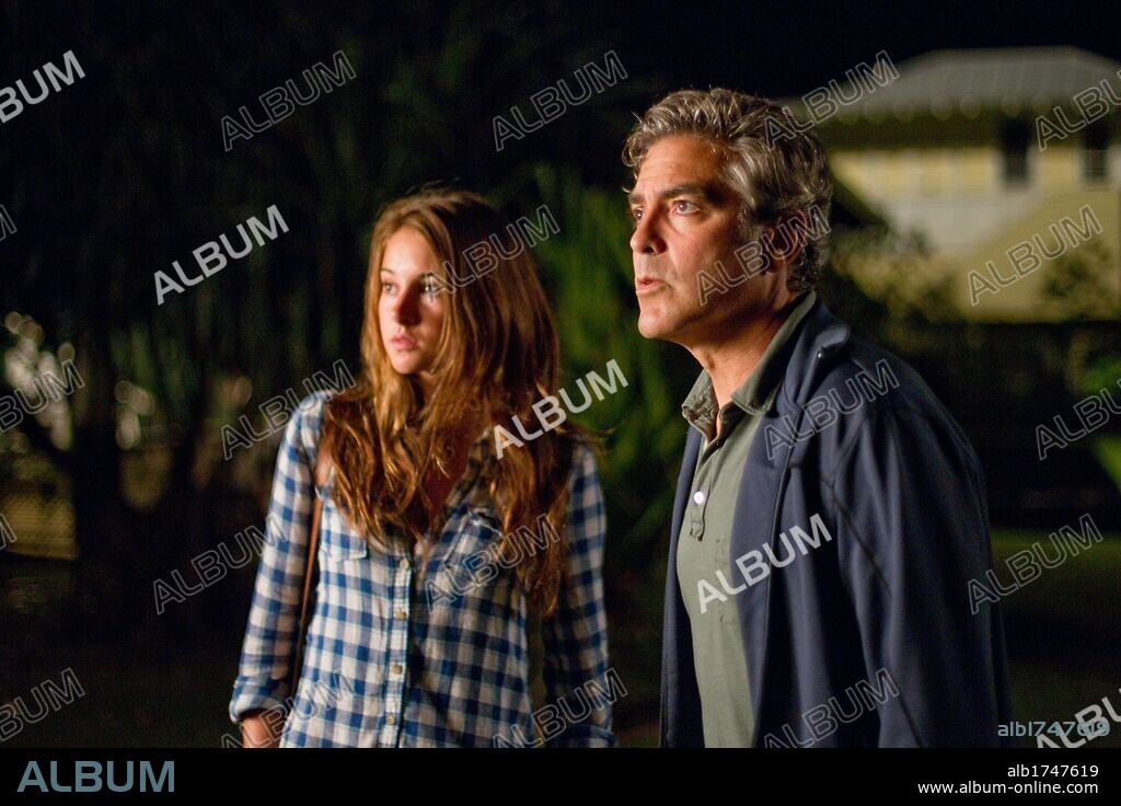 GEORGE CLOONEY and SHAILENE WOODLEY in THE DESCENDANTS, 2011, directed by ALEXANDER PAYNE. Copyright AD HOMINEM ENTERPRISES.