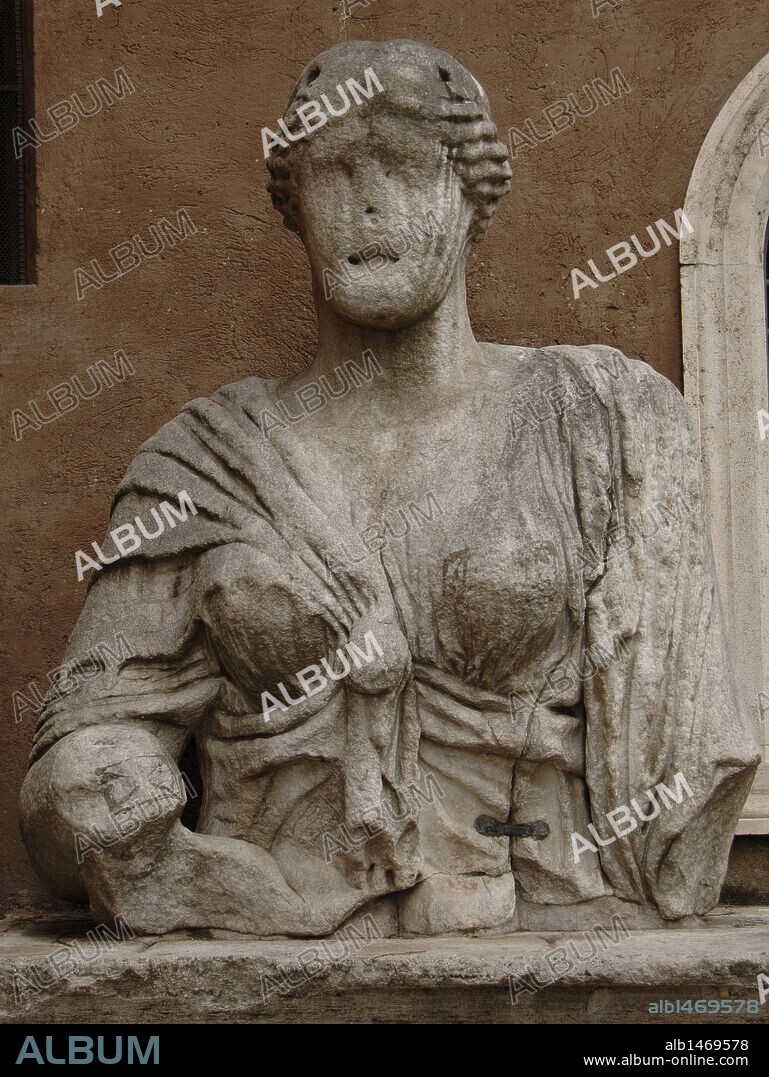 Madama Lucrezia. Roman colossal bust, possible representation of the Goddess Isis. Saint Mark Square. Rome. Italy.