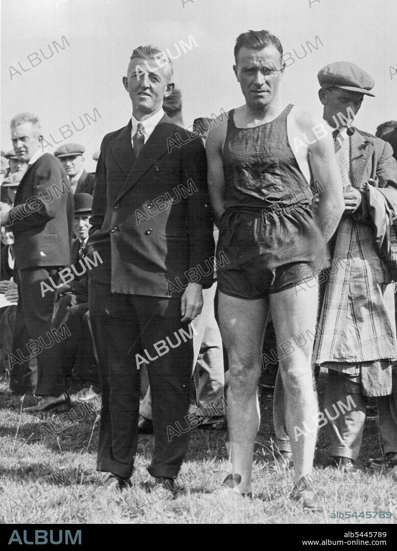Powderhall "PEO" For Australia -- Willie McFarlane with his trainer. Willie McFarlane, the Glasgow Pedestrian who has two "Powderhalls" to his credit, is leaving for Australia to-day (Fri) to competes against their crack runners. November 02, 1934. (Photo by London News Agency Photos Ltd.).