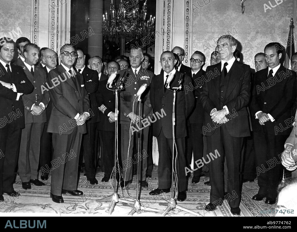 December 12, 1975. Inauguration of the presidency The inauguration ceremony of the New Ministers was held in the presidency of the government. First, the former first vice president and Minister of the Interior, Mr. José García Hernández, said some farewell words on behalf of the Outgoing Cabinet. The new Vice President for Defense Affairs and Minister without Portfolio, Lieutenant General Don Fernando de Santiago y Díaz de Mendívil, spoke later. The event closed with a speech by the President, Mr. Carlos Arias from Navarre.
