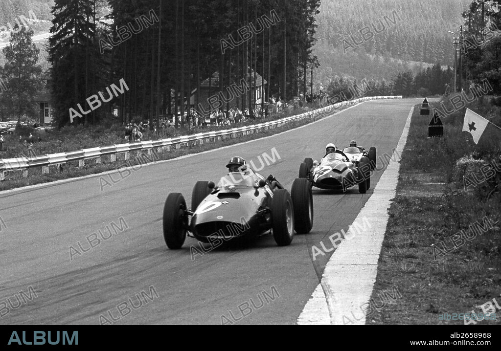 Graham Hill in a BRM48 leading Olivier Gendebien in a Cooper-Climax T53, he finished 3rd. Belgian Grand Prix, Spa-Francorchamps, Belgium 19 June 1960.