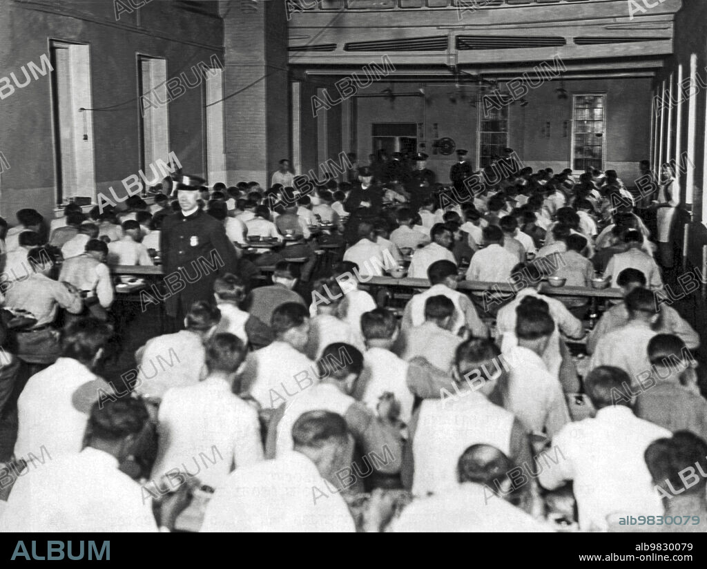 New York, New York: November 25, 1920, Inmates at the Blackwells Island prison enjoying Thanksgiving dinner.