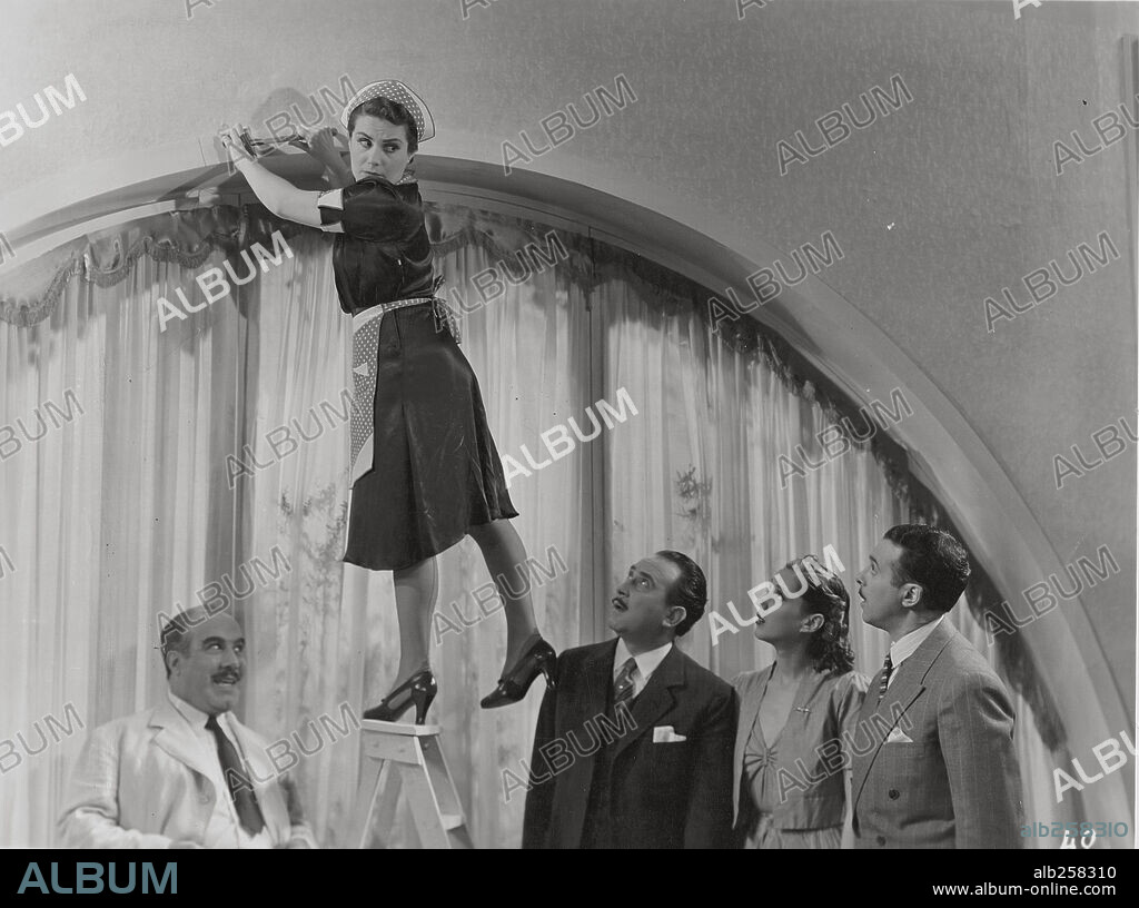 ADRIAN CUNCO, ALBERTO BELLO, ALEJANDRO MAXIMINO, LUCY GALIAND and NINI MARSHALL in HANDS ACROSS THE TABLE, 1935, directed by MITCHELL LEISEN. Copyright PARAMOUNT PICTURES.