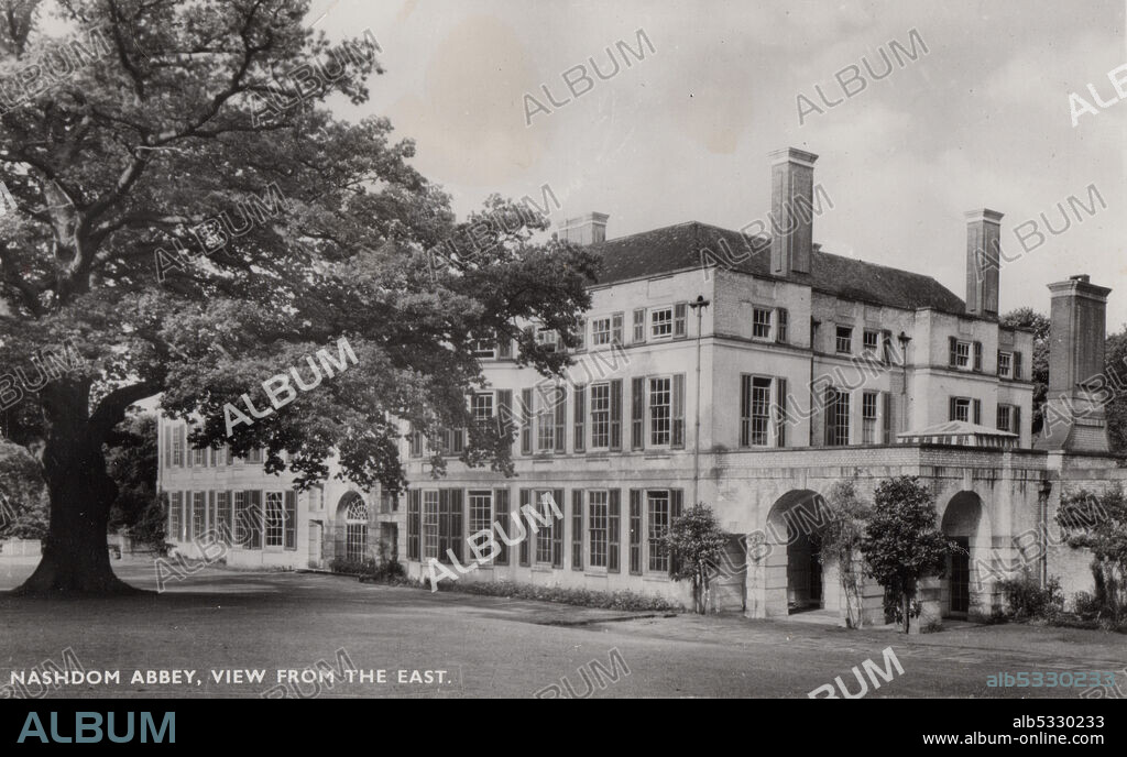 Nashdom Abbey, view from the east, c1950. Nashdom, designed in Neo-Georgian style by Edwin Lutyens, is a former Benedictine abbey in Burnham, Buckinghamshire.