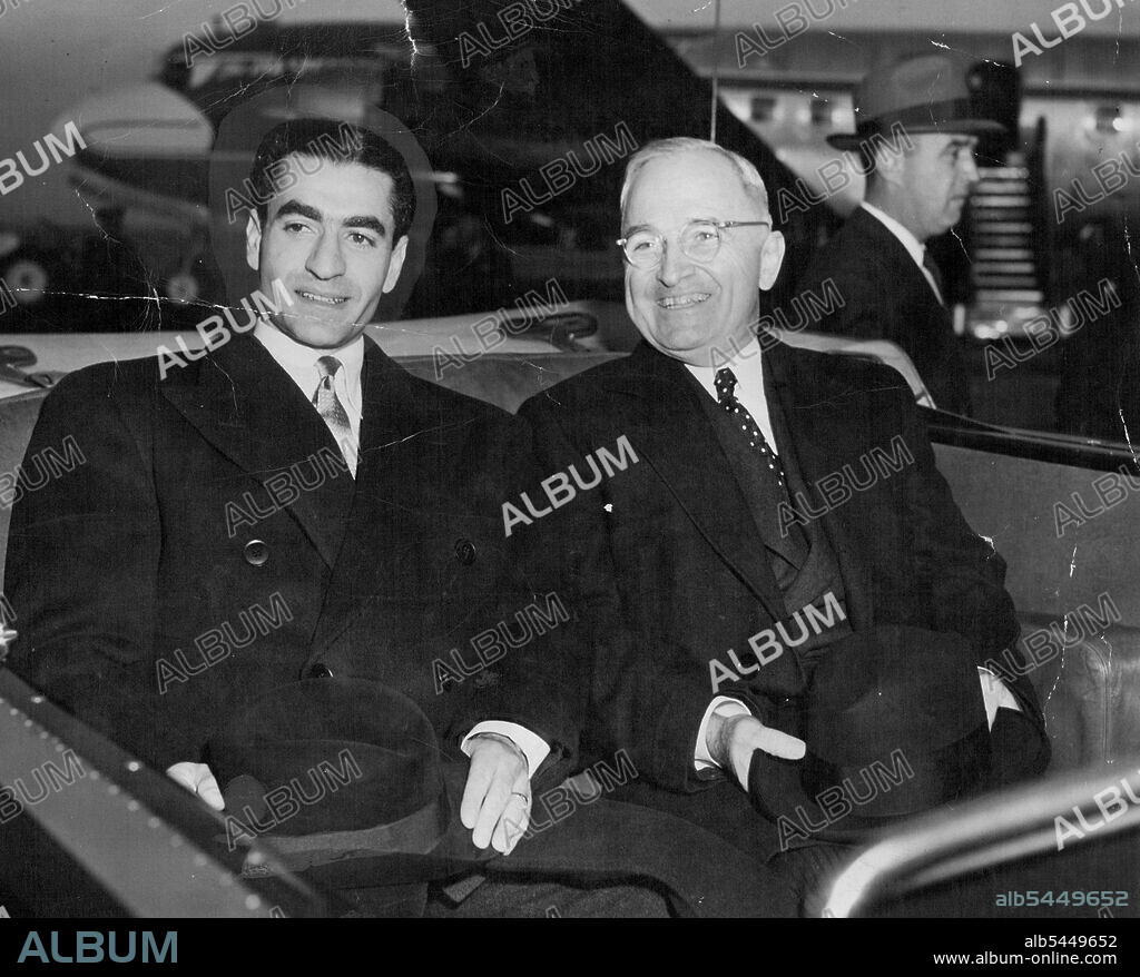 The Shah of Iran (left) and President Truman leave National Airport, on route to the District of Columbia Building in Washington, D.C., where the royal visitor was welcomed by municipal officials.Arriving at National Airport, Washington, D.C., capital of the United States, for an official visit, His Imperial Majesty, Mohammad Reza Shah Pahlavi, Shahinshah of Iran, was warmly welcomed by President Harry S. Truman, Secretary of State Dean Acheson and other high Government officials. November 16, 1949.