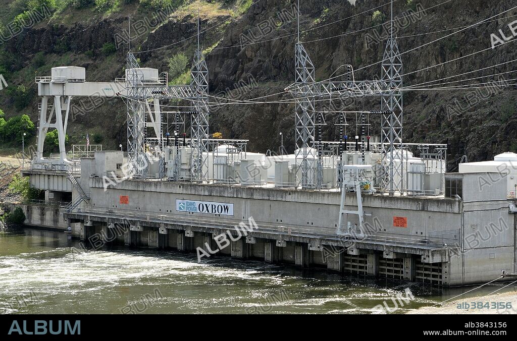 Oxbow Dam, a hydroelectric run-of-the-river rockfill structure on the Snake River in Hells Canyon, Idaho/Oregon border. It is part of the Hells Canyon Project that also includes Hells Canyon Dam and Brownlee Dam, built and operated by Idaho Power Co. The dam's powerhouse contains four generating units with a total nameplate capacity of 190 megawatts.