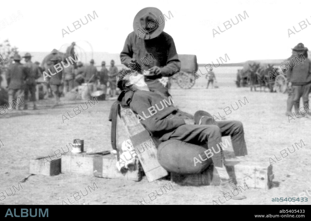 Barber of the Brigade Headquarters near Casa Grande, Mexico. The Pancho Villa Expedition was a military operation conducted by the US Army against the forces of Mexican revolutionary Pancho Villa from March 1916 - February 1917, during the Mexican Revolution of 1910-20. The expedition was launched in retaliation for Villa's attack on the town of Columbus, New Mexico. Despite successfully locating and defeating the main body of Villa's command, responsible for the raid on Columbus, US forces were unable to achieve Wilson's stated main objective of preventing Villa's escape. William Fox for Underwood & Underwood, 1916.