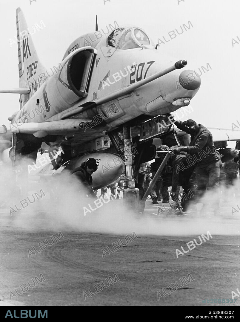September 1968 - An A-4F Skyhawk attack plane is brought to the launching position on a steam catapult aboard USS Intrepid (CVS-11), during flight operations in the Gulf of Tonkin. Note nosewheel steering bar in use. Official U.S. Navy Photograph.