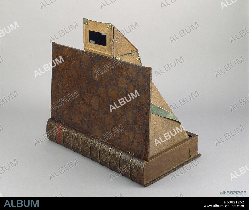 Book-form camera obscura from the Nekes collection, c. 1750. When open, the device measures 56 cm. in height. Title on spine: "Theatre de Univers". The camera obscura is an optical device that projects an image of its surroundings on a screen. It is used in drawing and for entertainment, and was one of the inventions that led to photography and the camera.