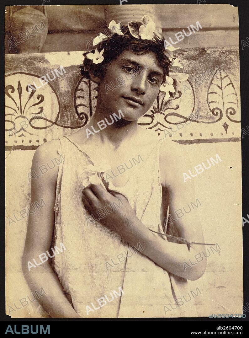 L'Offerta (The Offering); Baron Wilhelm von Gloeden, German, 1856 - 1931; Taormina, Sicily, Italy, Europe; 1902; Albumen silver print; Image: 22.4 x 16.8 cm (8 13/16 x 6 5/8 in.).
