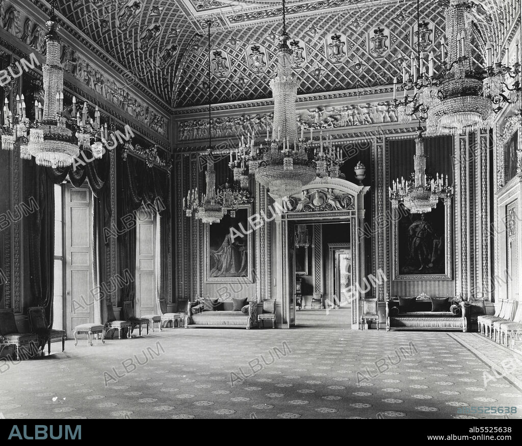 Interiors Of Buckingham Palace -- The white drawing room from the North west, showing entrance to the music room, and the blue drawing room beyond. December 06, 1937. (Photo by The Topical Press Agency Ltd.).