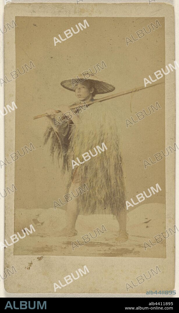 Japanese man wearing straw rain cape and hat, carrying a long pole, Attributed to Unknown maker, Japanese, 1865–1875, Hand-colored albumen silver print.