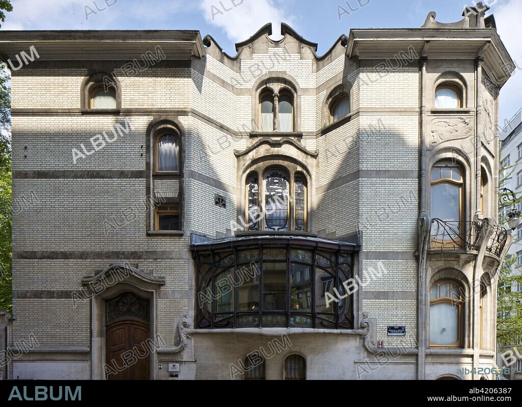 Hotel Hannon, 1 Avenue de la Jonction, Brussels, Belgium, c2014-c2017. Designed by Jules Brunfaut:1902 for Edouard Hannon , and is the only Art Nouveau creation by architect Jules Brunfaut. The facades combine white brick with stone and is asymmetric. Oriel window decorated with stained glass by Raphael Evaluate.