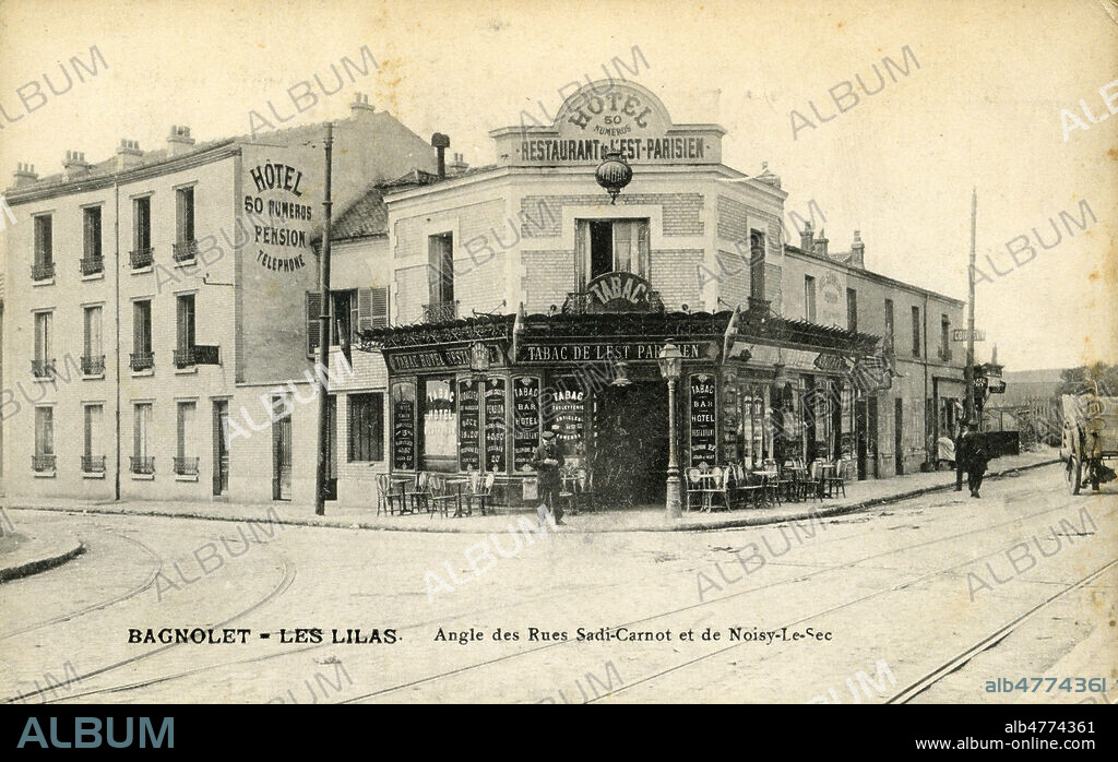 'Bagnolet, Les Lilas : angle des rues Sadi-Carnot et de Noisy-Le-Sec' avec hotel. Photographie anoyme pour une carte postale vers 1910. Credit : Jean Vigne/KHARBINE-TAPABOR.
