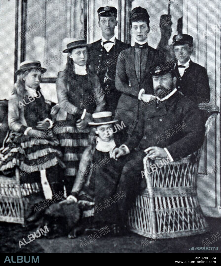 Photograph of Edward VII with Queen Alexandra of Denmark, the Duke of Clarence, King George VI and his two daughters. Dated 19th Century.