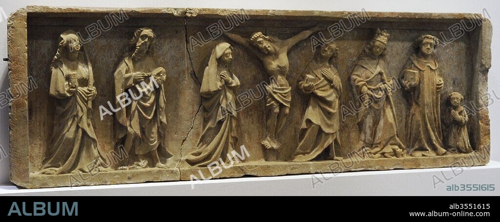 Arte medieval. Retablo. Crucifixión con santos y un donante. Región de Mosela, Francia, hacia el 1450. Piedra calcárea del tipo Jaumont. Museo Schnütgen. Colonia, Alemania.