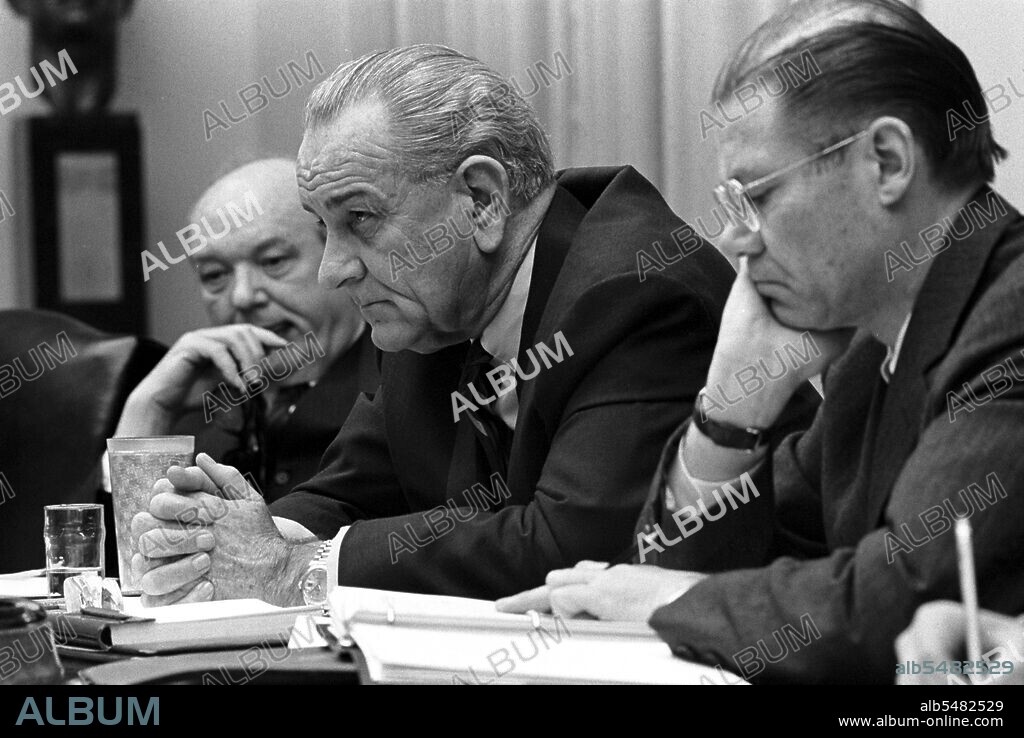 Left to right, Dean Rusk, US Secretary of State (1961-1969), Lyndon Baines Johnson, US President (1963-1969) and Robert McNamara, US Secretary of Defense (1961-1968) confer in the White House Cabinet Rooom, February 1968, at the height of the Tet Offensive in Vietnam (30 January - 28 March, 1968).