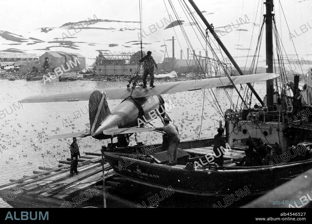Photograph - George Rayner, Lockheed Vega, Antarctica, 1928, UNLOADING A LOCKHEED VEGA AEROPLANE FROM SHIP. AEROPLANE IS MARKED WILKINS HEARST. THE SHIP IS THE WILLIAM SCORESBY. PROBABLY TAKEN BY GEORGE RAYNER.