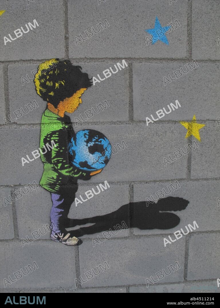 Ilustración de niño con globo terráqueo entre sus manos proyectando su sombra; graffiti mural, Plaza de las Glorias; Distrito San Martin, Barcelona en 2014.