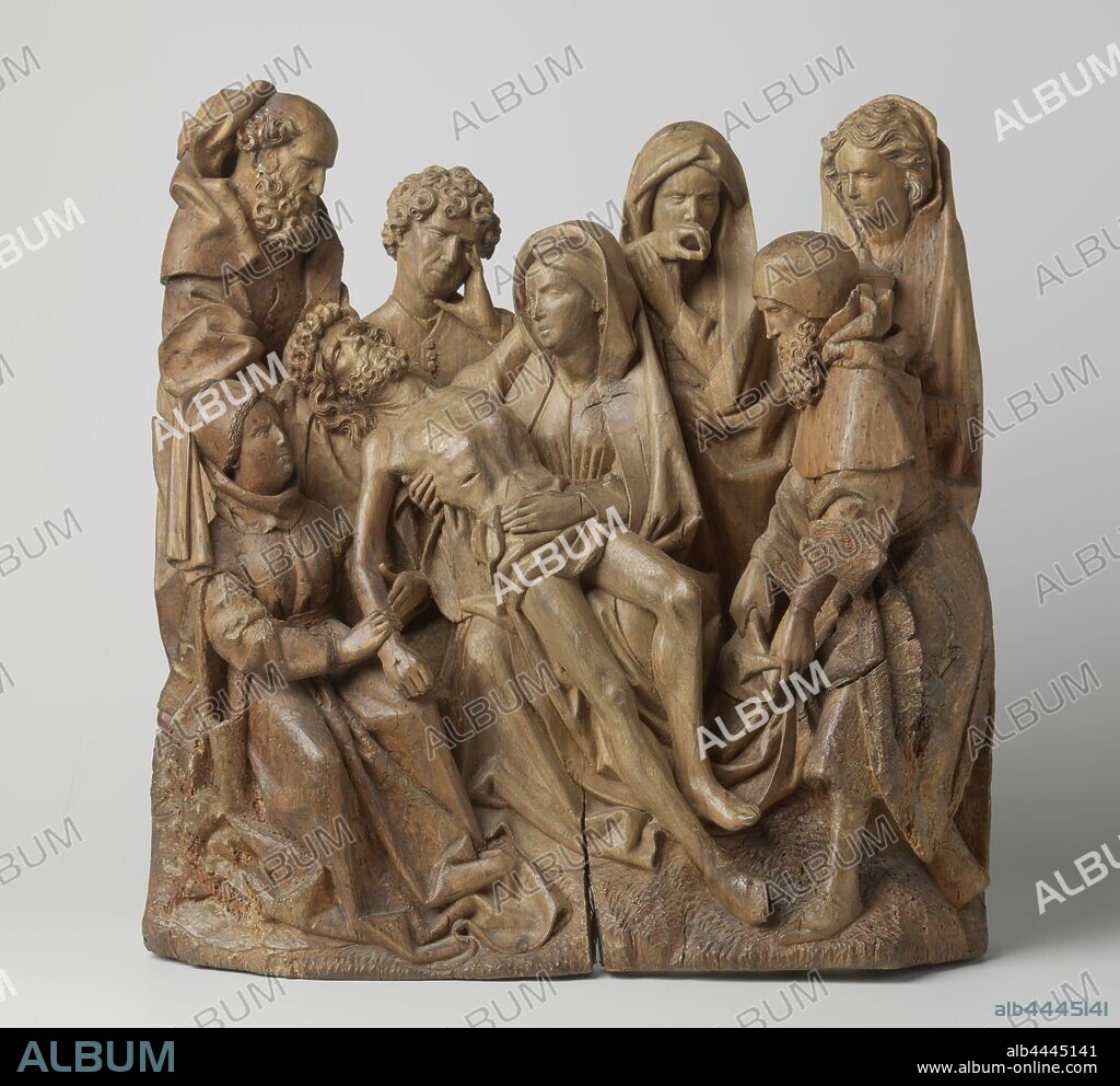 The Lamentation, In the midst of the three Marys, John Joseph of Arimathea and Nicodemus is Mary. Her gaze rests on her son, lying on a shroud, who has just been laid on her lap by Joseph of Arimathea and Nicodemus. Christ's left arm is supported by Mary's shoulder, one of Maria's coast is his hand. The seated Mary, on the left in the foreground, embraces Christ's right arm with both hands. To the left behind Maria stands Johannes and holds his hand to his face, which is full of sorrow. Behind Nicodemus (?) Stands Mary Magdalene, holding her ointment jar against her breast. The woman in the foreground wears a second with wide arm slits over a long-sleeved robe and a belt around her waist, on the head she has a cap with frowned edges, ending in a lamfer from behind and draped around her neck and over the cap. The remaining women wear a long-sleeved dress with a belt around the waist and coats that are pulled over the head. Nicodemus and Joseph of Arimathea wear a cloak with long, narrow sleeves and a closed cloak with turned back, wide sleeves and a shoulder cloak with a hood. Nicodemus also carries a bonnet. Johannes is dressed in an undergarment and a cloak closed with buttons. The hairs and beards of the figures are strongly curled, Christ's body supported by Mary, others present, descent from the cross: Christ is tasks down from the cross, usually by Nicodemus and Joseph or Arimathaea who are standing on the ladders (both arms of Christ detached), anonymous, c. 1440 - c. 1450, walnut (hardwood), h 44.2 cm × w 42.3 cm × d 17 cm.