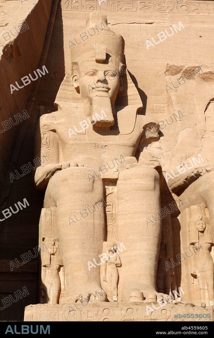 A photograph taken of the Abu Simbel Temple, in Nubia, Southern Egypt, near the border with Sudan. The complex is a UNESCO World Heritage Site. The temple dates to the 13th century BC, during the 19th dynasty reign of the Pharaoh Ramesses II. It is a monument to the king and commemorates his victory at the Battle of Kadesh. The complex was relocated in its entirety in 1968 under the supervision of a Polish archaeologist, Kazimierz Michalowski, on an artificial hill made from a domed structure, high above the Aswan High Dam reservoir.