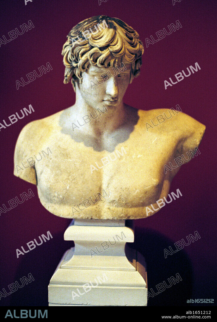 Bust of Antinous From Patras, (National Archaeological Museum of Athens) Antinous or Antinous (Greek: ????????) (111- 130) member of the entourage of the Roman Emperor Hadrian, to whom he was beloved. Antinous was deified after his death.