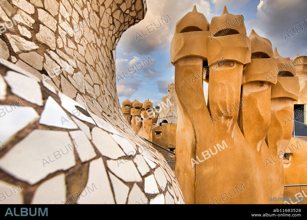 Chimneys on the rooftop of Casa Mila, La Pedrera building, Antoni Gaudi, Barcelona, Catalonia, Spain, Europe.
