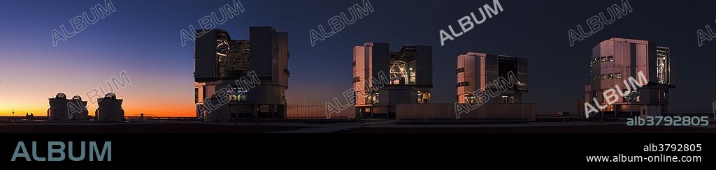 The evening twilight fades in to darkness over Cerro Paranal, Chile, the location of four 8-meter telescopes of the VLT (Very Large Telescope). Photographed in this image are also 4 auxiliary smaller telescopes (each one meter in diameter) of the VLT interferometer.