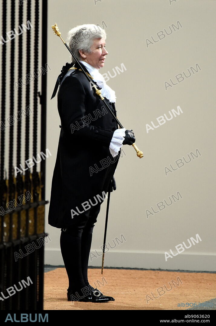 Photograph of Sarah Clarke (1965-) in her role as The Lady Usher of the Black Rod. Black Rod is principally responsible for controlling access to and maintaining order within the House of Lords and its precincts, as well as for ceremonial events within those precincts. Before taking this role, she was in charge of the administration of The Championships, Wimbledon.