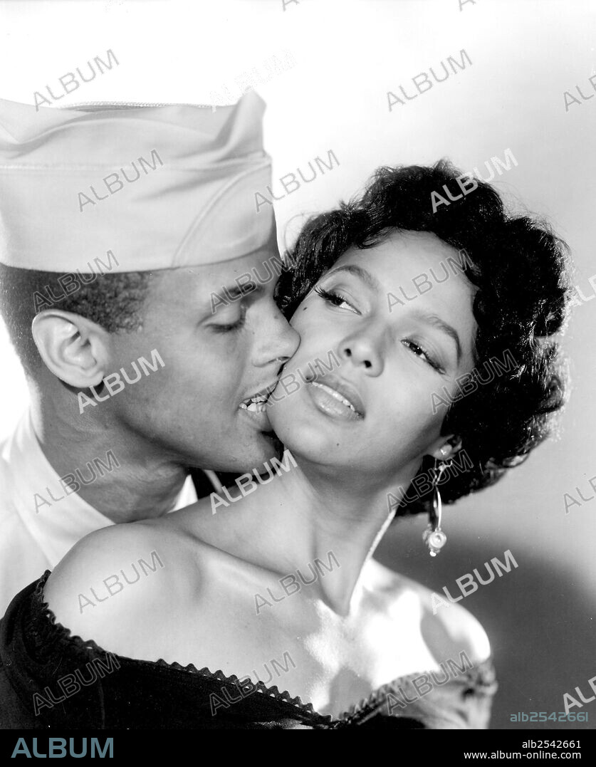 DOROTHY DANDRIDGE and HARRY BELAFONTE in CARMEN JONES, 1954, directed by OTTO PREMINGER. Copyright 20TH CENTURY FOX.