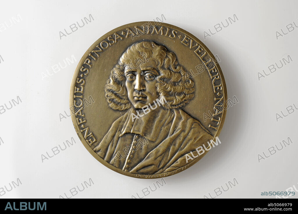 commemorative token, Johannes Cornelis Wienecke, 1927, minted, General: 6.5 x 0.3cm (65 x 3mm), Weight: 89.7g, house, man's portrait, bust, Medal commemorating the 350th anniversary of Spinoza's death in 1927. The front features a three-quarter left-angled bust of Spinoza. Spinoza has long curly hair and is dressed in a toga. Around the performance the caption: EN.FACIES.SPINOSA.ANIMIS.EVELLERE.NATI. Marked bottom right. On the back is the house of Spinoza with sun rays behind it and clouds above it. Below the inscription: DOMUS.SPINOZANA RHENOBVRGI BENE.AGERE.ET LAETARI ETH.IV.PROP.LXXIII.SCHOL, with a palm branch and a cable edge on both sides. At the bottom a wax stamp with an unclear depiction and inscription. Around the inscription: PER.REALITATEM.ET.PERFECTIONEM.IDEM.INTELLIGO ETH.II.DEF.VI., 1927.