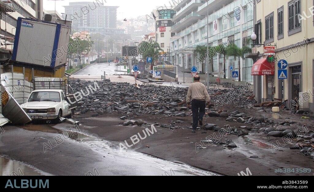 The aftermath of the extreme weather event of February 20, 2010 in Madeira, Portugal. 42 people were killed on the island as a result of flooding and landslides. In the city of Funchal, depicted here, more than 4 inches of rain dropped in a 5-hour period, causing rivers to overflow, the flood sweeping away cars and trees.