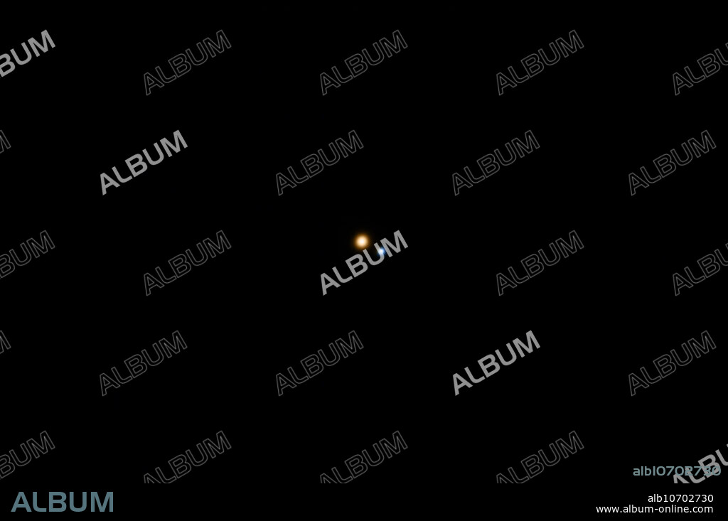 Gamma Andromedae is Almach, one of the most beautiful double stars in the night sky. It is the third brightest star in the constellation of Andromeda. In a telescope, Almach can be seen to be a gold and blue pair of stars separated by 9.58 arcseconds. The primary star (Gamma 1 Andromedae, also known as the A component) is a spectral-type K3 giant with a golden-yellow color. The secondary star (Gamma 2 Andromedae), at a position angle of 63 degrees, is an A-type main sequence star. Gamma 2 Andromedae is itself a double star with components labeled B and C that are separated by less than 1 arcsecond. Subsequent spectroscopic observations in 1957 to 1959 revealed that B is another double star, making the entire Gamma Andromedae system a quadruple star. The Almach star system is located 350 light-years away. Johann Tobias Mayer discovered that Almach was a double star in 1778, and Wilhelm Struve discovered that Gamma 2 Andromeda was a double star in.