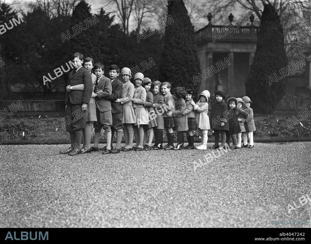 Cavendish family group of 16 grandchildren in the gardens of Chatsworth, Derbyshire, Christmas 1929. The grandchildren of Victor Cavendish, 9th Duke of Devonshire.