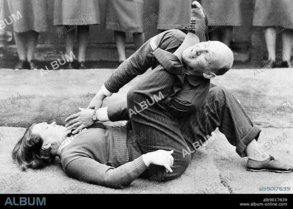 Photograph of the Women's Auxiliary Air Force (WAAF) demonstrating self-defence. Dated 1942.