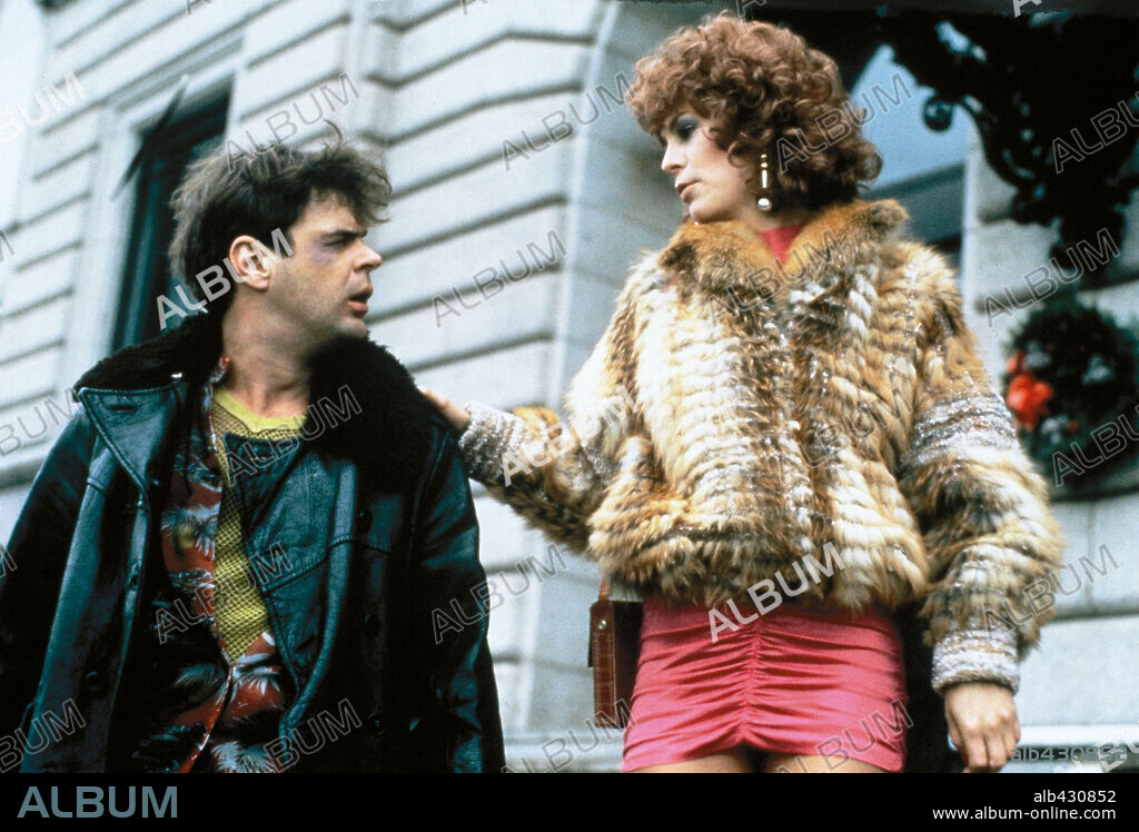 DAN AYKROYD y JAMIE LEE CURTIS en ENTRE PILLOS ANDA EL JUEGO, 1983 (TRADING PLACES), dirigida por JOHN LANDIS. Copyright PARAMOUNT PICTURES.