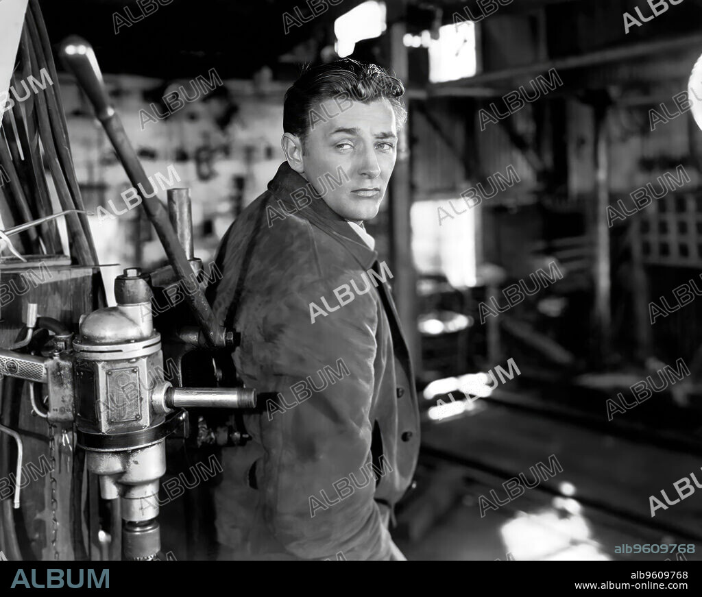 ROBERT MITCHUM en RETORNO AL PASADO, 1947 (OUT OF THE PAST), dirigida por JACQUES TOURNEUR. Copyright RKO RADIO PICTURES.