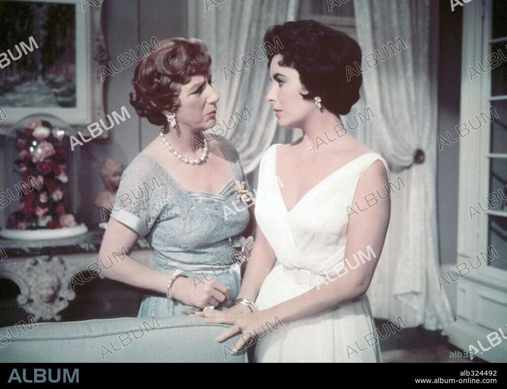 ELIZABETH TAYLOR and JUDITH ANDERSON in CAT ON A HOT TIN ROOF, 1958, directed by RICHARD BROOKS. Copyright M.G.M.