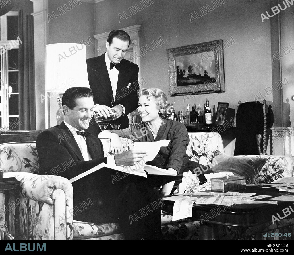 GRACE KELLY, RAY MILLAND und ROBERT CUMMINGS in DIAL M FOR MURDER, 1954, unter der Regie von ALFRED HITCHCOCK. Copyright WARNER BROS.