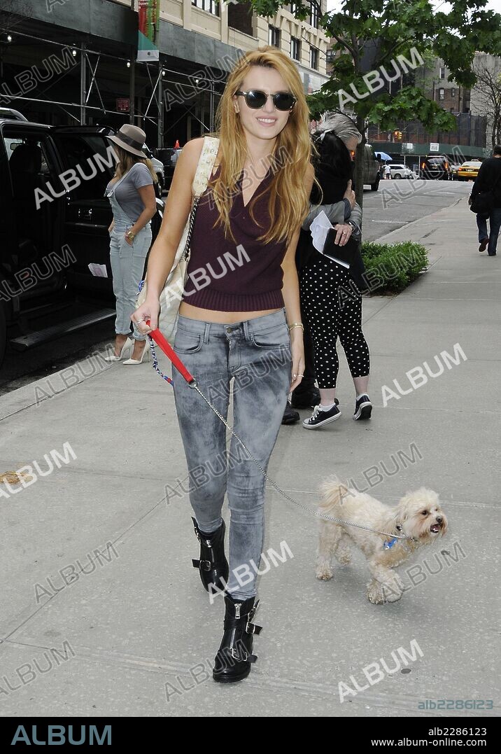 May 23, 2014 - New York City, NY, United States - ACEPIXS.COM....May 23 2014, New York City....Actress Bella Thorne walks her dog in Soho on May 23 2014 in New York City. 23/05/2014