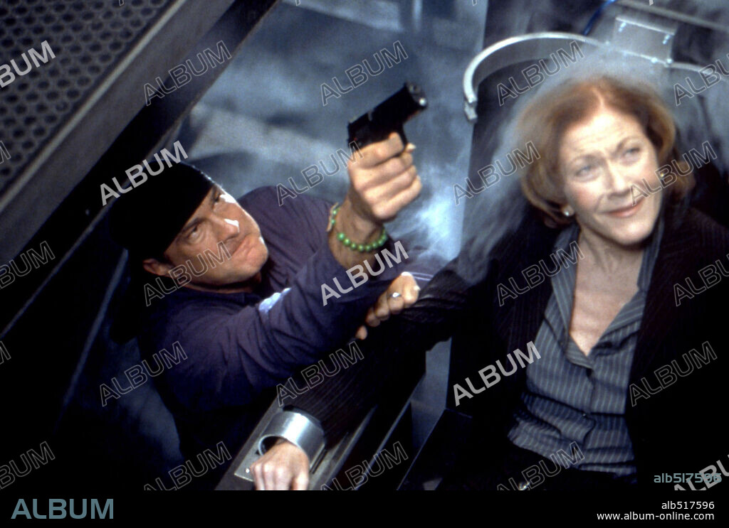 CLAUDIA CHRISTIAN and STEVEN SEAGAL in HALF PAST DEAD, 2002, directed by DON MICHAEL PAUL. Copyright SCREEN GEMS.