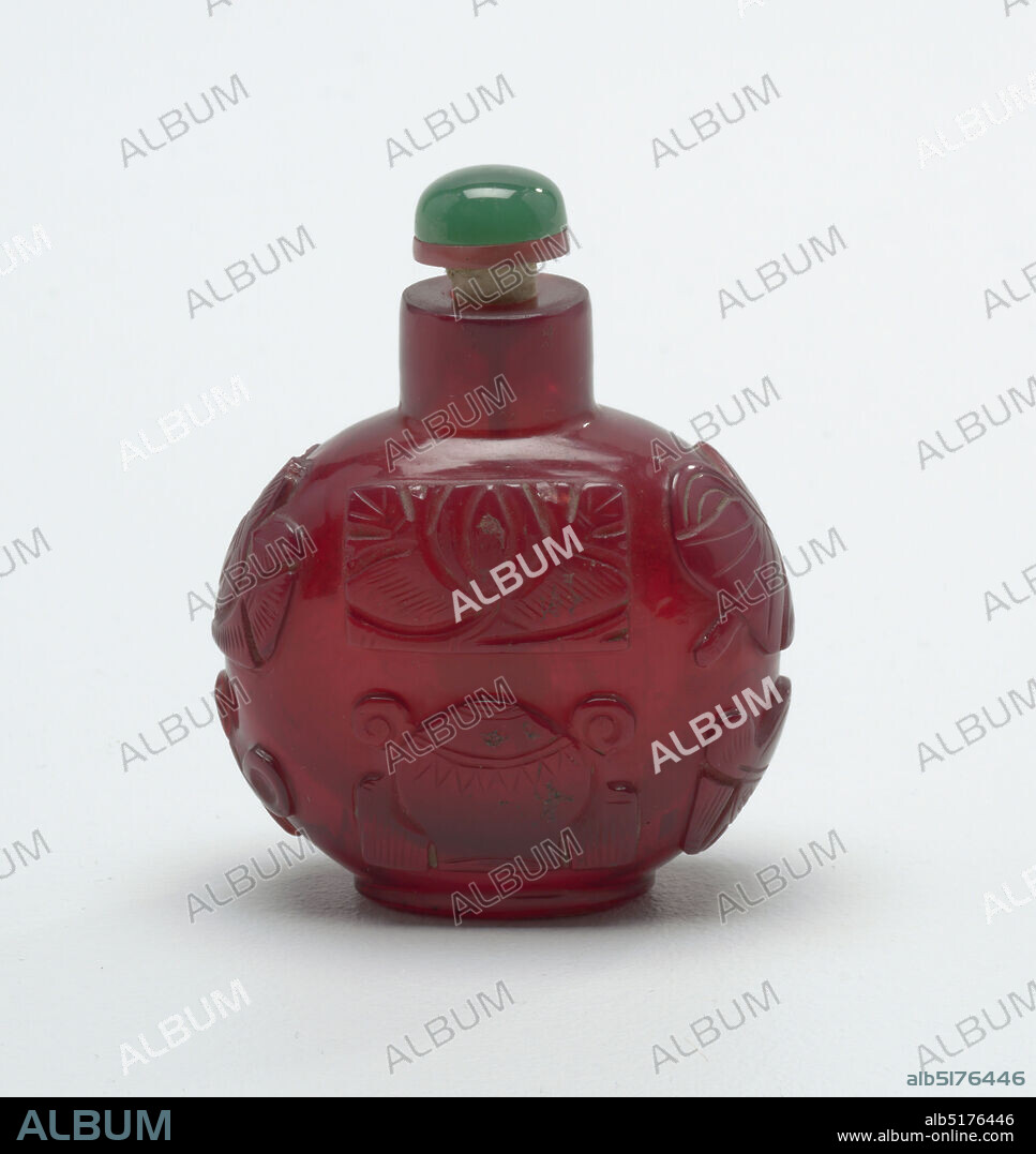 snuff bottle, glass, ivory (spoon), Monotone cameo-glass, ruby red; carved with eight precious emblems of good fortune; wheel of law, conch shell, umbrella canopy, lotus flower, pair of fish, endless knot. Flattened globose shape. Stopper of green glass simulating jade and set on pale red glass. Ivory spoon., China, 182151, glasswares, Decorative Arts, snuff bottle.
