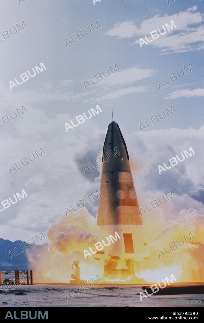 First flight of the Delta Clipper DC-X prototype; 8/18/1993.  Here the DC-X blasts off.  This was the first vehicle in the Delta Clipper program.  The vehicle was envisioned as a reuseable single-stage rocket to provide a cheap and reliable way to get satellites into orbit.  The DC-X was one-third of the size of the final design.  The project is currently in limbo, after funding was cut in the mid-1990's.  During this flight, the vehicle rose about 50 meters high, and maneuvered about 100 meters to one side whilst hovering.  It then landed vertically on its four retractable legs.
