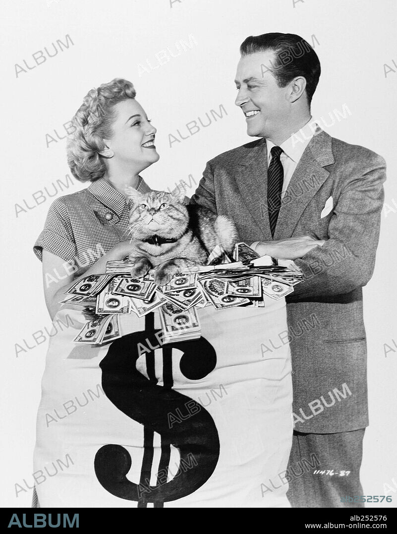 JAN STERLING and RAY MILLAND in RHUBARB, 1951. Copyright PARAMOUNT PICTURES.