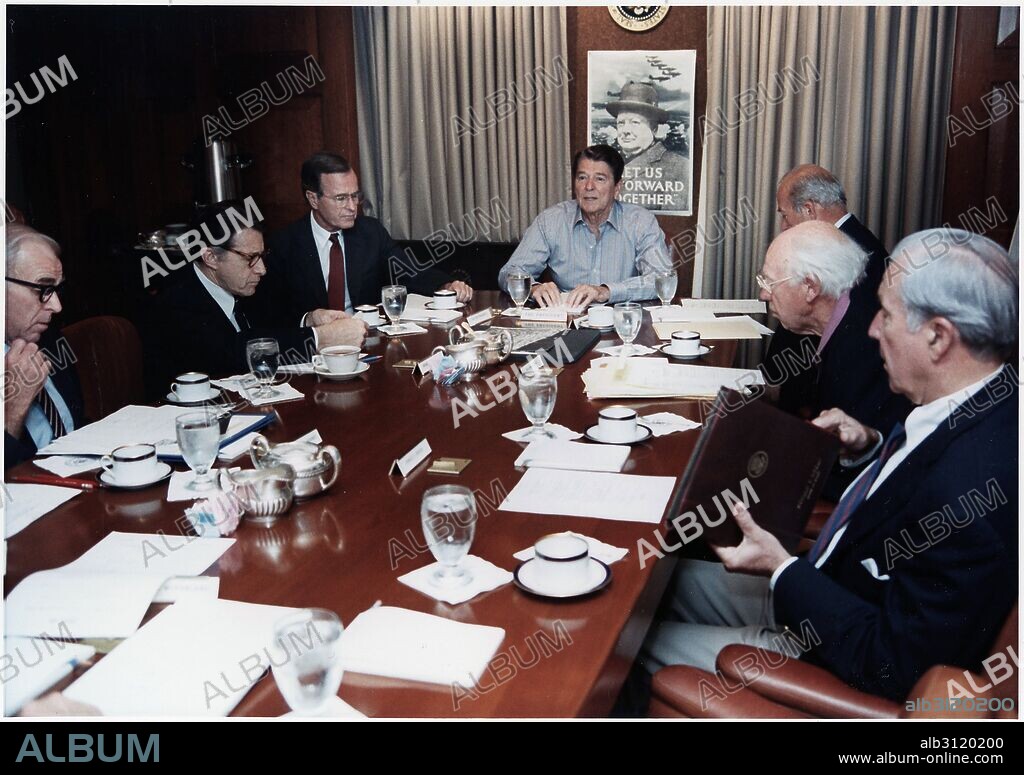 Photograph of President Ronald Reagan holding a National Security Council Meeting on the TWA hijacking in the Situation Room in the White House. Dated 1985.
